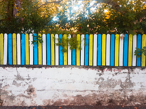 Multi colored wooden decorative fence