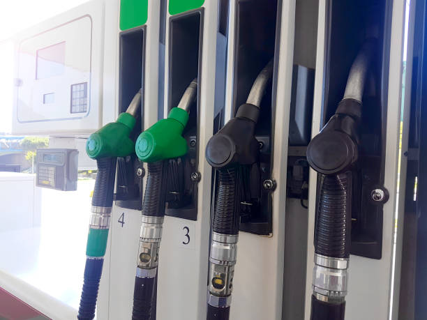 istock Gas station with four pistols 1285792883