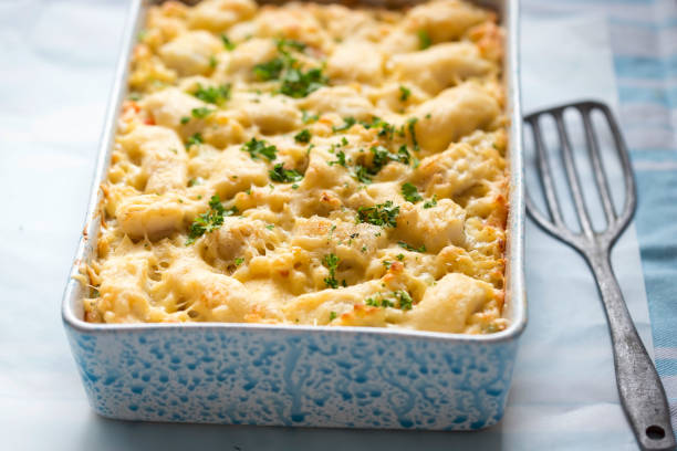 Fish pie mac ’n’ cheese with cod, carrot & peas Fish pie mac ’n’ cheese with cod, carrot & peas ice pie photography stock pictures, royalty-free photos & images