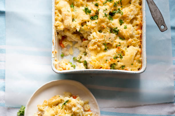 Fish pie mac ’n’ cheese with cod, carrot & peas Fish pie mac ’n’ cheese with cod, carrot & peas ice pie photography stock pictures, royalty-free photos & images