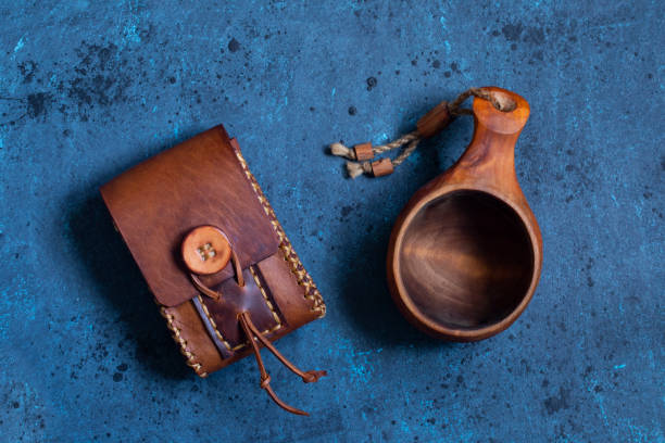 small handmade leather case and bushcraft equipment