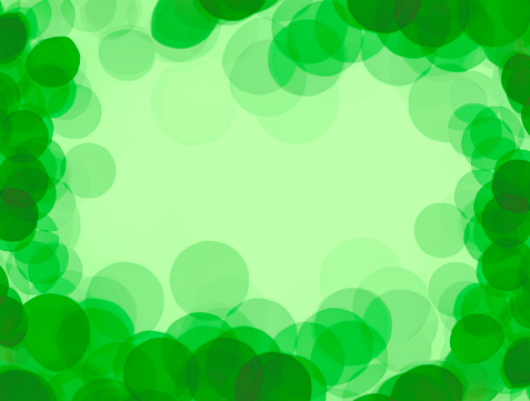 Frame made of defocused lights in green tones. Inversion (negative) effect.