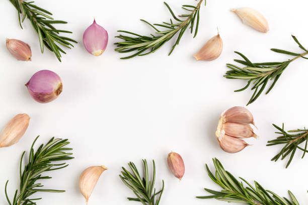 istock Top view Rosemary with garlic isolated on white background 1285797274