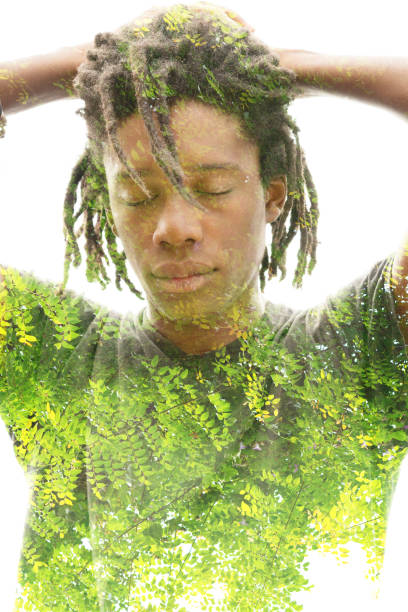 istock Young man double exposure portrait with leaves 1285798187