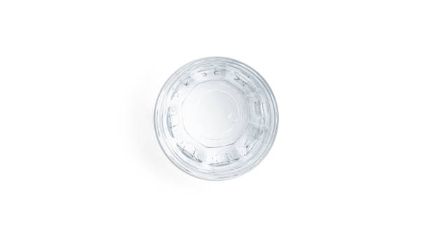istock Vodka shot glass on a white background 1285800936