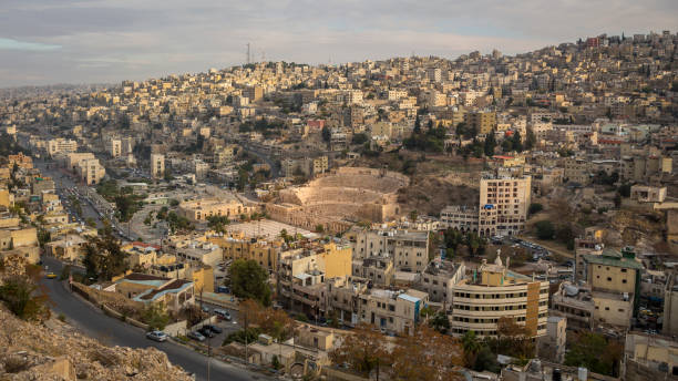 Amman and the Roman Theater View on Roman Theater in Amman - Jordan amman city stock pictures, royalty-free photos & images