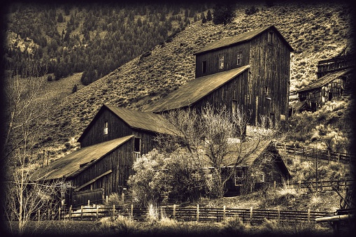 The old mill at the ghost town of Bayhorse, Idaho with a vintage finished look.
