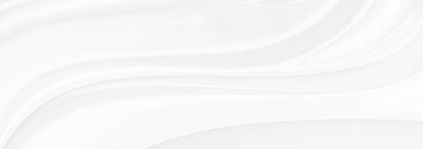 istock White gray satin texture that is white silver fabric silk panoramic background with beautiful soft blur pattern natural. 1285805958