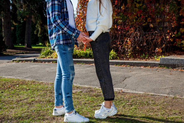 istock Young couple in the park 1285808324
