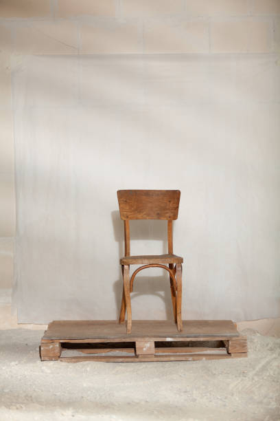 istock Stylish wooden chair on white background 1285810049