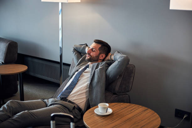 istock Businessman is napping on a small bed 1285812474