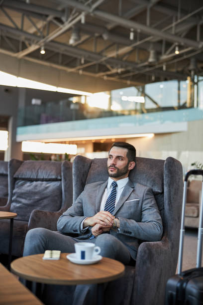 istock Man adjusting the watch on his wrist 1285812523
