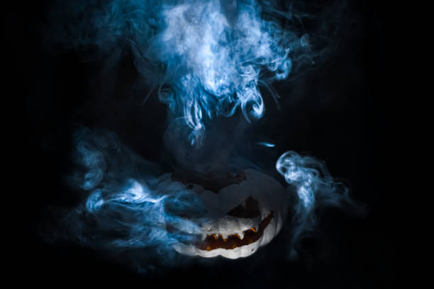 istock Jack is a horrible hellish pumpkin covered in thick smoke. 1285812587