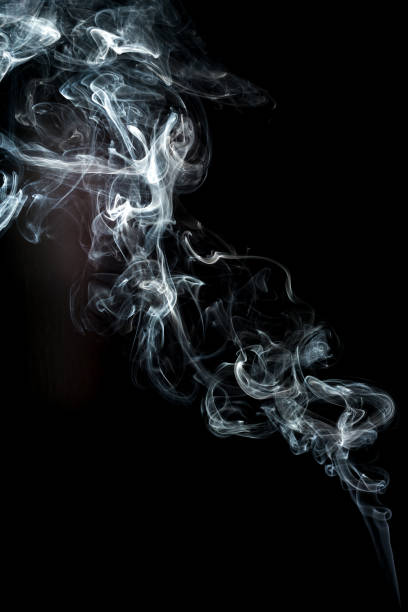 istock smoke cloud with black background. fog texture 1285813654