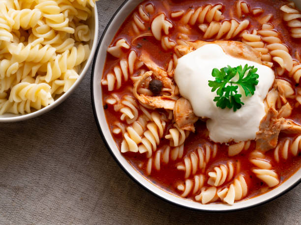 istock Traditional tomato soup with noodles, whitened with cream 1285813716