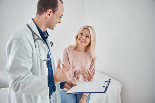 istock Patient talking to the doctor during the physical examination 1285815644