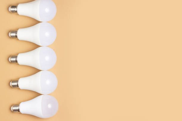 istock Energy saving light bulbs. Ecology care concept 1285816402