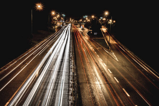 istock Car lights In traffic at night 1285820857