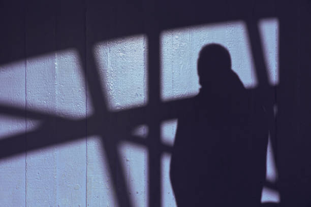 istock A shadow of a man on the wall 1285825814