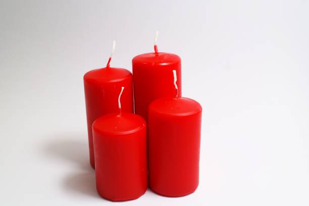 istock Four red candles, symbol of christmas comming. 1285825885