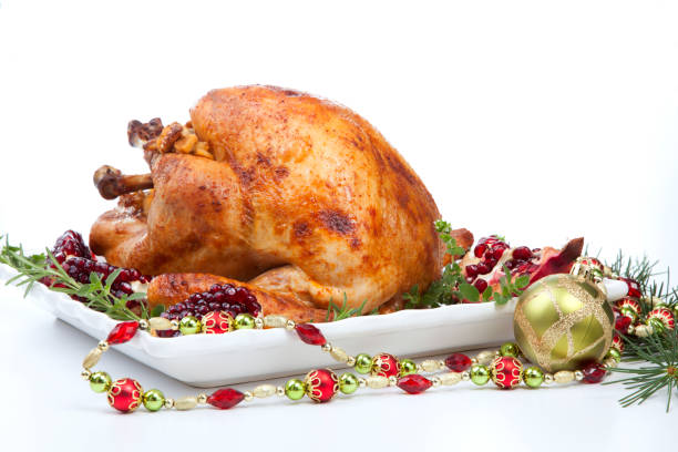 istock Pomegranate Glazed Roasted Turkey on White 1285828219