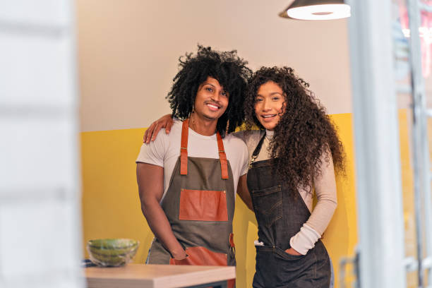 istock Happy couple seeing their restaurant newly opened 1285829903