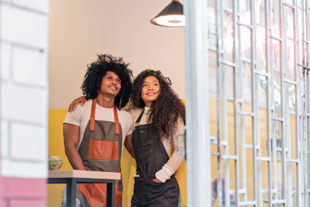 istock Happy couple seeing their restaurant newly opened 1285829977