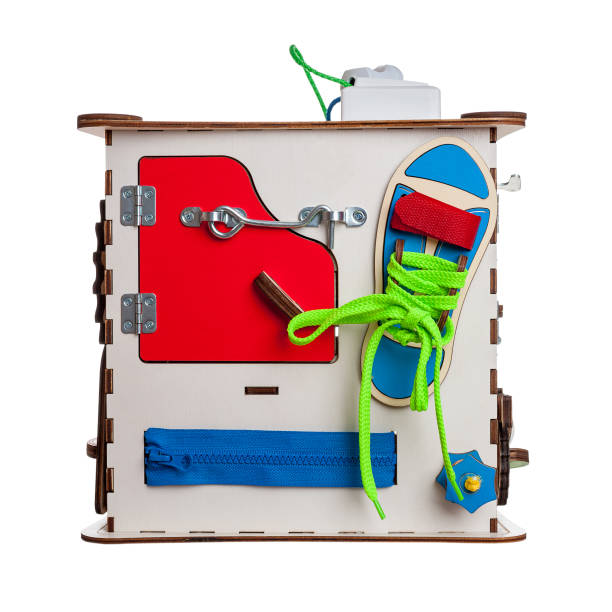 istock children's educational toy busycube, busyboard, isolated on a white background, the development of motor skills and coordination in kids, design 1285832572