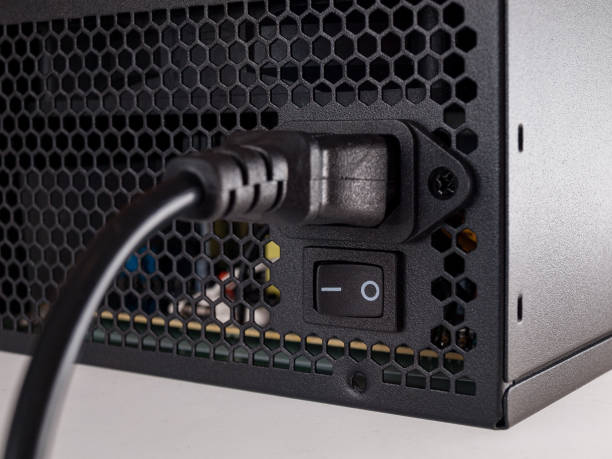 istock Computer part for system unit assembly, power supply for computer close-up, choice of quiet silent reliable power supply 1285833951