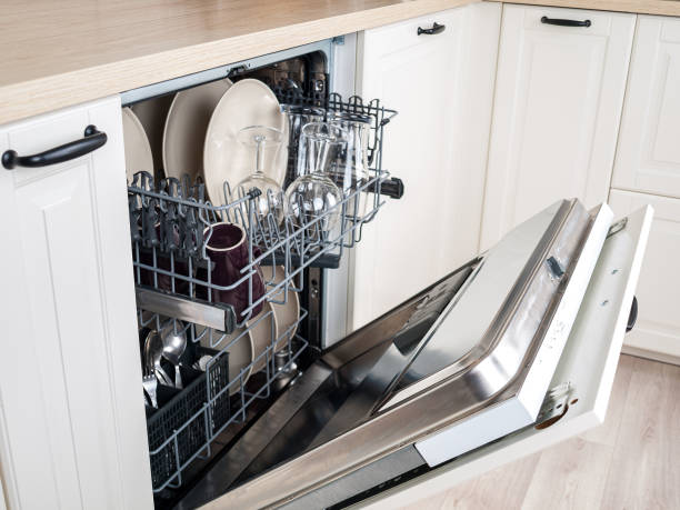 istock dishwasher close-up with washed dishes, easy to use and save water, eco-friendly, built-in kitchen dish washing machine 1285835066