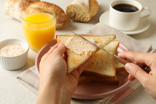 istock Concept of cooking toasts on white table 1285835255