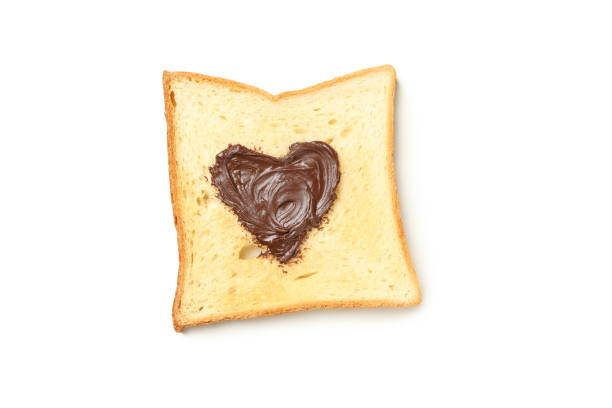 istock Toast with chocolate in heart shape isolated on white background 1285835366