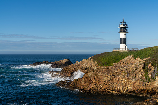 A view of the lighthouse on Isla Pancha in Galicia