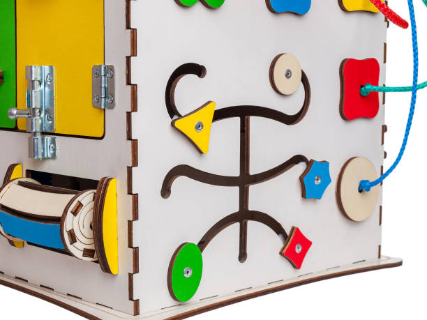 istock children's educational toy busycube, busyboard, isolated on a white background, the development of motor skills and coordination in kids, design 1285837216