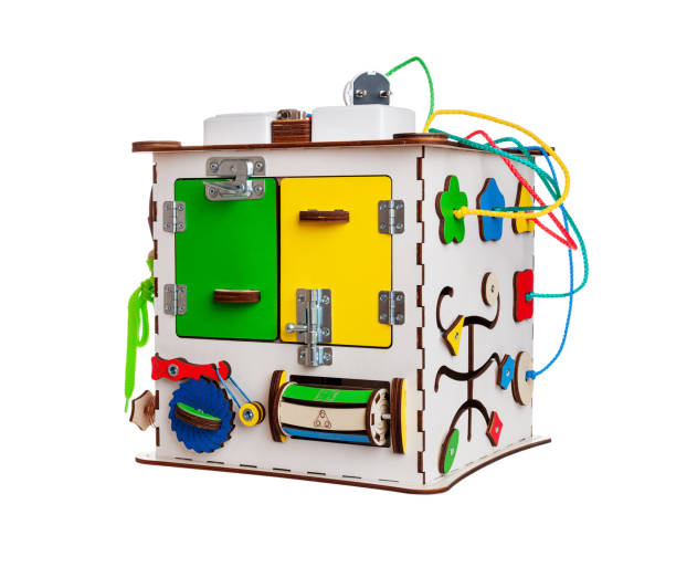 istock children's educational toy busycube, busyboard, isolated on a white background, the development of motor skills and coordination in kids, design 1285837340