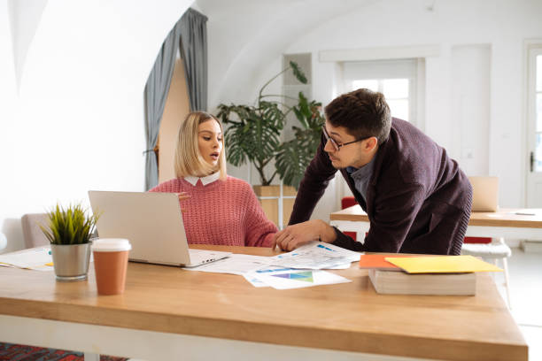 istock Businessman having mischiefs in office 1285838750