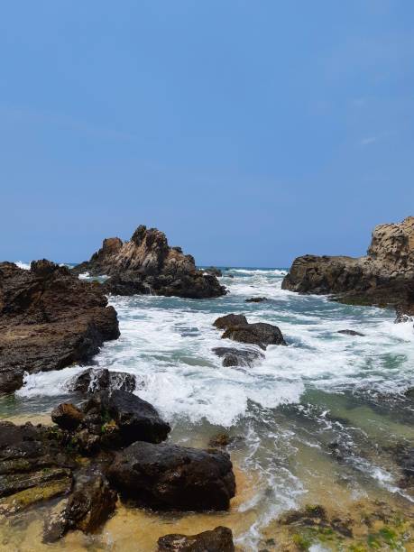 istock Beautiful rocks landscape at shore in Indonesia. 1285841036