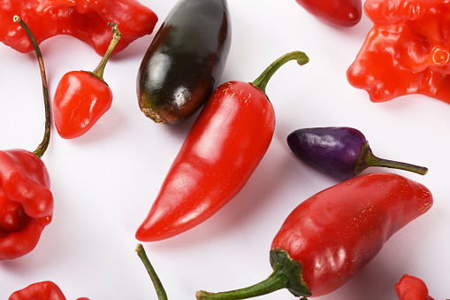 Chili peppers mix on the white background, red chili pepper, green chili pepper, chili pepper, Jalapeno pepper