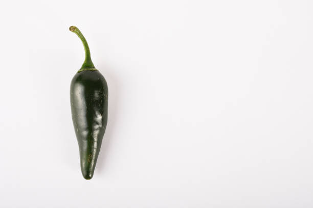 istock A Green Jalapeno pepper on the white background with copy space 1285843201