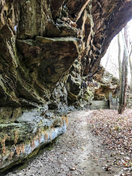 istock Dirt path alongside rock wall at Indiana nature preserve 1285846239