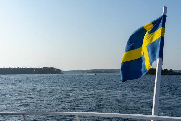 istock Swedish flag by the sea 1285848329