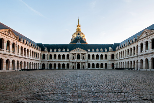 Sunset on Les Invalides court of honor empty, during second wave and second coronavirus lockdown in Paris, in autumn.  France, November 12, 2020.