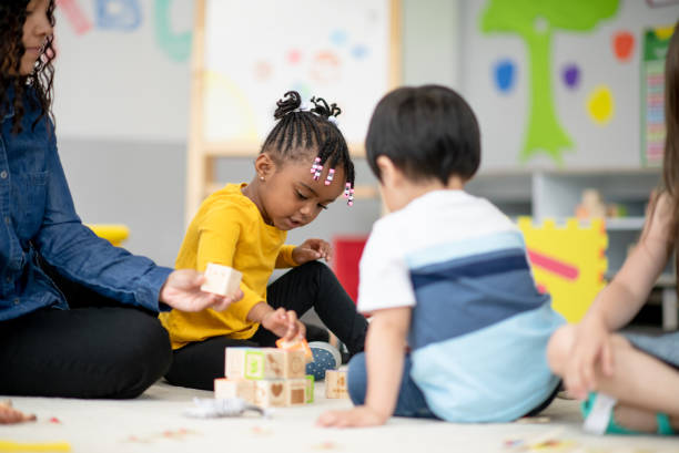 istock Preschoolers on the carpet 1285857897