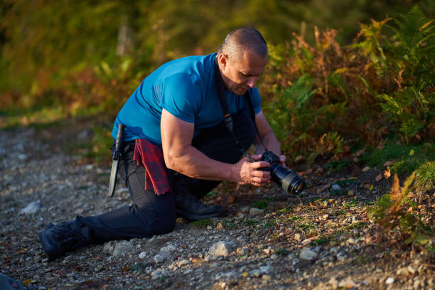 istock Nature photographer shooting macro 1285865633