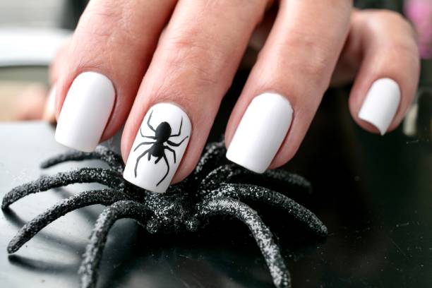 czarny spider nail art design - color image halloween people elegance zdjęcia i obrazy z banku zdjęć