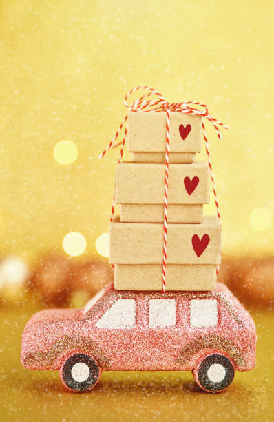 Little Pink Car Carrying Gift Stack for the Holidays