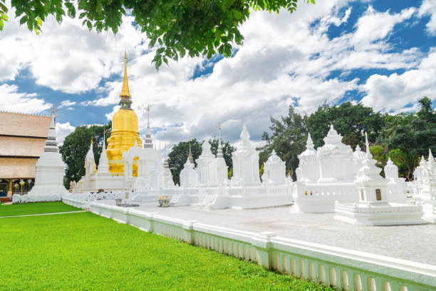istock Suan Dok temple, Wat Suan Dok (monastery) with blue sky in Chiang Mai. 1285869933