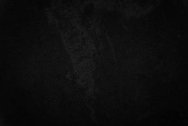 istock Close up retro plain dark black cement & concrete wall background texture for show or advertise or promote product and content on display and web design element concept decor. 1285870825