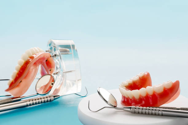 istock Teeth model showing an implant crown bridge model. 1285870868