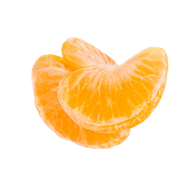 istock Fresh mandarine slices isolated on white background. Ripe tangerine fruit segment. 1285872709